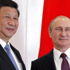 El presidente ruso, Vladimir Putin, y el presidente chino, Xi Jinping, durante una reunión de los BRICS celebrada en la reciente cumbre del G20 en Antalya.-EFE / YURI KOCHETKOV