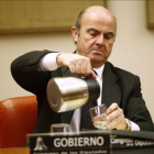 Guindos compareciendo en una Comisión de Economía del Congreso.-AGUSTÍN CATALAN