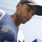 Sergio Morate, este viernes, llega escoltado al tribunal rumano de Lugoj.-EFE / ADRIAN PICLISAN