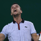 Bautista celebra uno de los puntos ganados ante Djokovic.-AFP / WANG ZHAO