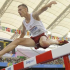 El atleta polaco Lukasz Parszczynski.-AFP / PETER PARKS