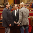 Oriol Junqueras, Artur Mas y Raül Romeva, en el Parlament.-JULIO CARBÓ