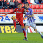 Leão persigue a Julio Álvarez en el partido contra el Numancia-LFP