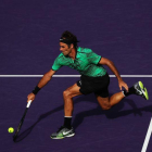 Roger Federer ya está en semifinales de Miami.-AL BELLO / AFP