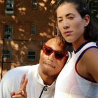 Garbiñe Muguruza y Pharell Williams.-EL PERIÓDICO