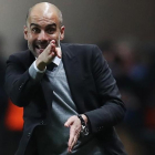 Pep Guardiola, durante la derrota del Manchester City ante el Mónaco.-AFP / VALERY HACHE