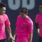 Munir, Messi y Sandro, durante un entrenamiento del Barça.-JORDI COTRINA