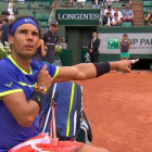 Nadal distute con el juez de silla Carlos Ramos durante su partido contra Bautista.-