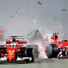 El accidente entre Vettel y Kimi Raikkonen.-EFE