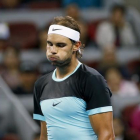 Nadal resopla tras perder un punto ante Djokovic.-REUTERS