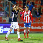 Kiko Olivas ante Míchel, en el último Girona-Real Valladolid.-E.M.