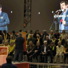Jordi Sànchez, proyectado en las pantallas del mitin de este viernes en Barcelona, en el que se pasó el audio que grabó desde Soto del Real.-/ PERIODICO (EFE / TONI ALBIR)