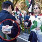 Pablo Fernández muestra su carnet de procurador en las Cortes a un policía nacional.