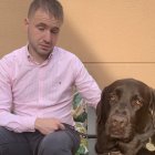El vallisoletano Héctor Melero, fiscal en Valencia, y su perro guía Anís.