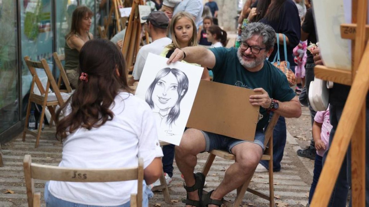 Caricaturistas en la Acera de Recoletos de Valladolid