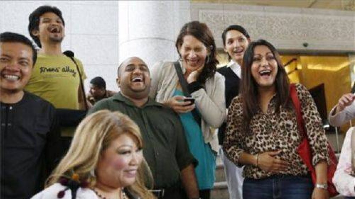 Las activistas transexuales celebran el triunfo en la corte de apelación de Putrajaya.-Foto: REUTERS
