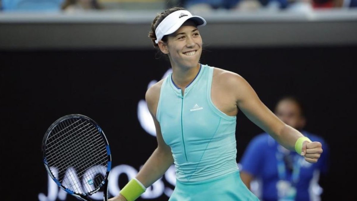 Garbiñe Muguruza celebra su victoria sobre Sorana Cirstea en octavos de final del Abierto de Australia.-EFE / MADE NAGI