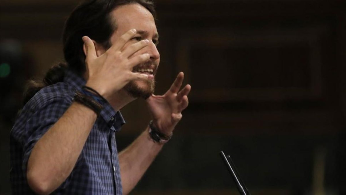 Pablo Igleias interviene desde la tribuna de oradores del Congreso de los Diputados, el pasado 27 de septiembre.-JOSÉ LUIS ROCA