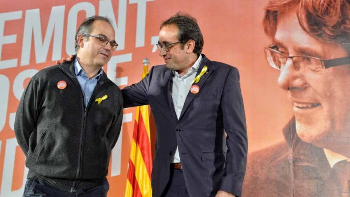 Jordi Turull y Josep Rull han manifestado tristeza por los que han quedado en la cárcel.-EFE