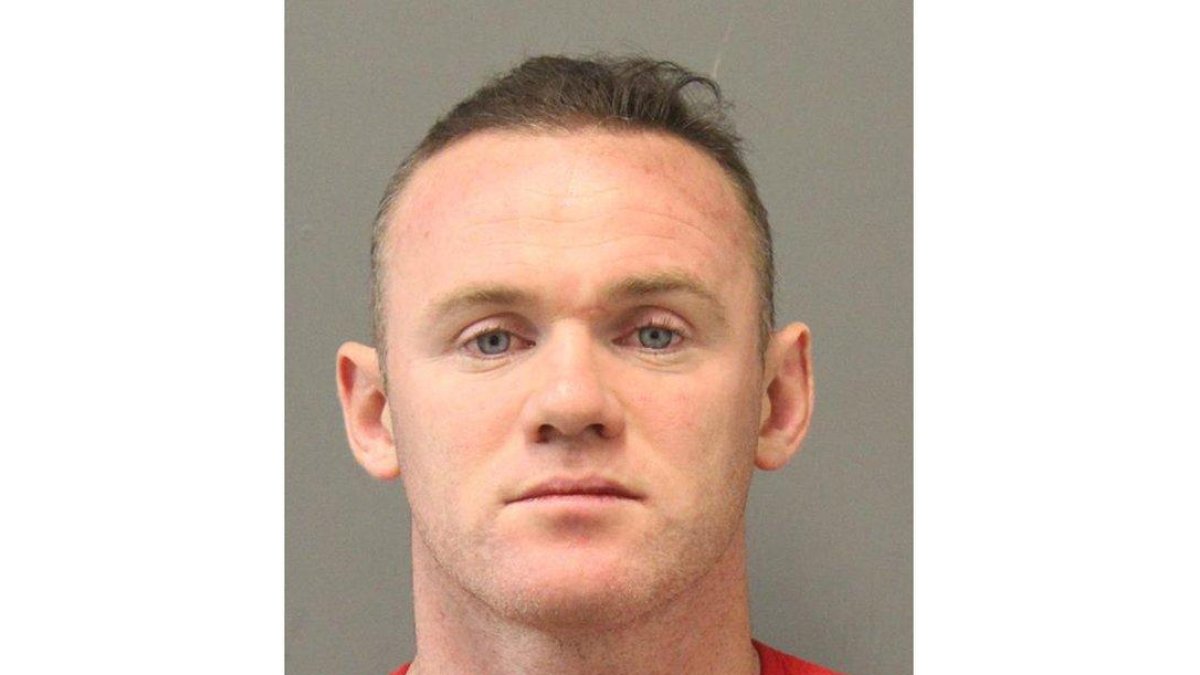La foto policial de Rooney.-