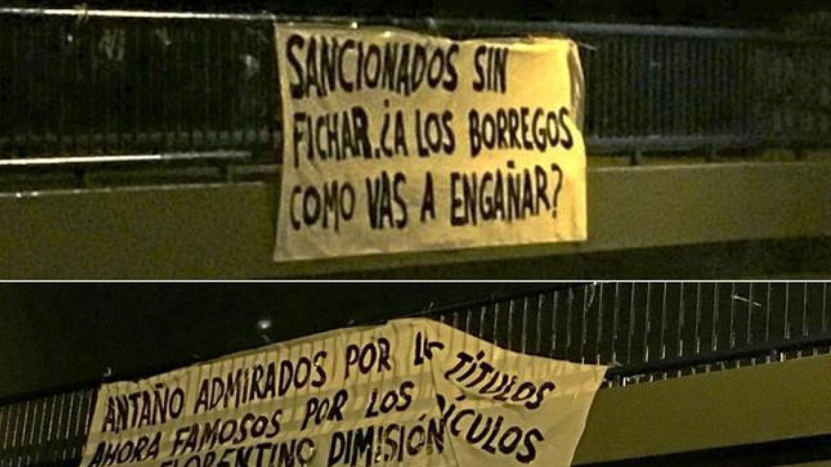 Pancartas contra Florentino Pérez en Madrid tras la sanción de la FIFA.-