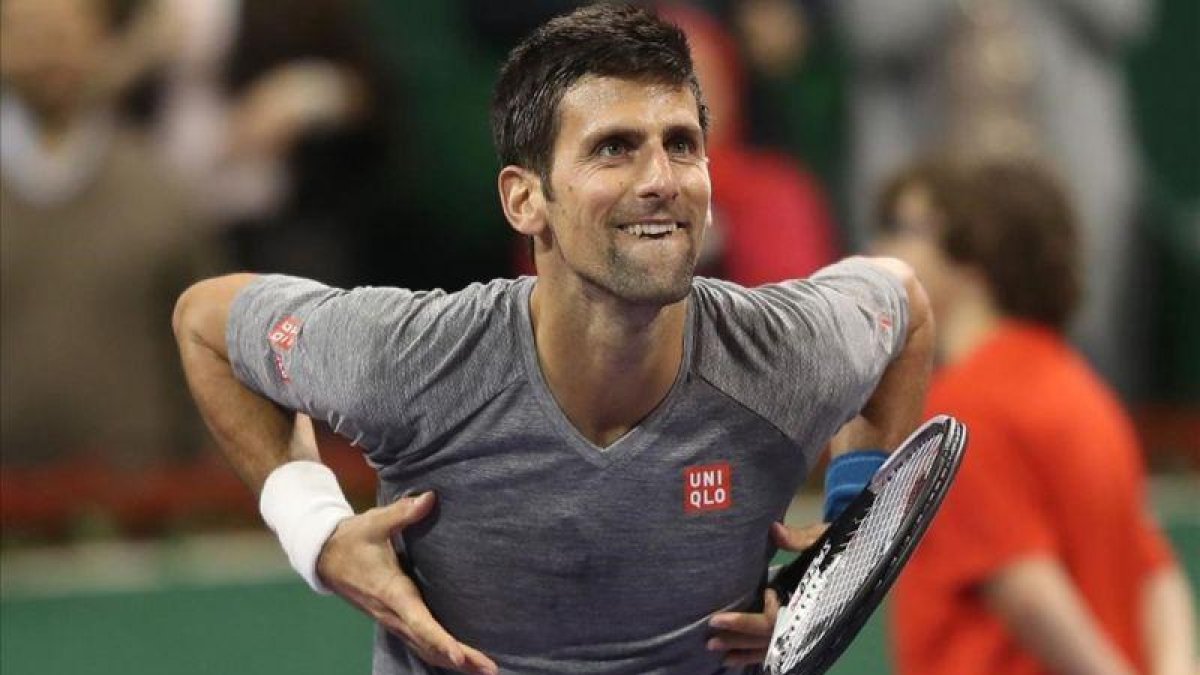 Novak Djokovic tras ganar el torneo de Doha.-AFP / KARIM JAAFAR