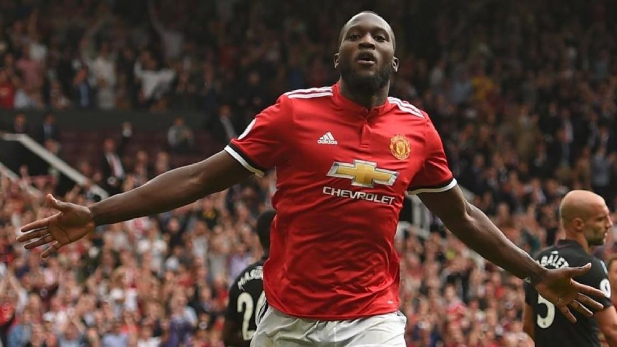 Lukaku celebra su segundo gol en el partido ante el West Ham.-OLI SCARFF