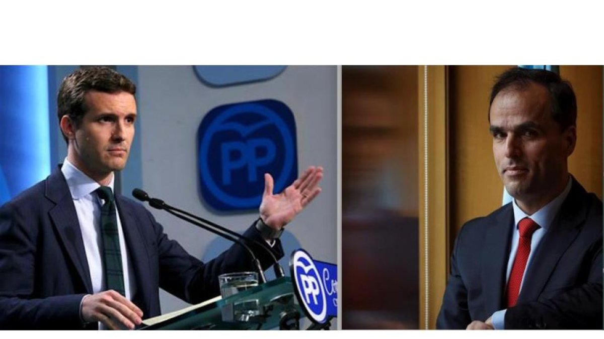 El vicesecretario de Comunicación del PP, Pablo Casado, a la izquierda durante una comparecencia pública para negar irregularidades en la obtención de sus títulos universitarios. A la derecha, el rector de la Universidad Rey Juan Carlos, Javier Ramos.-JOSE MANUEL PRATS/ EMILIO NARANJO