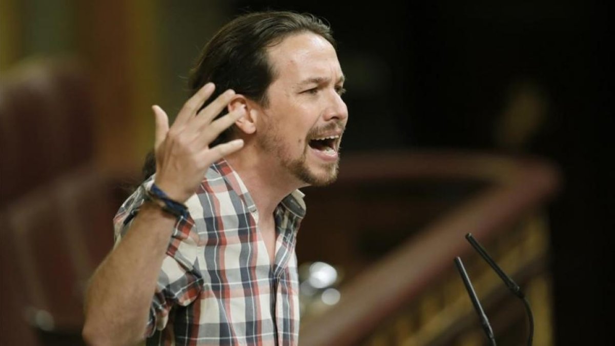 El secretario general de Podemos, Pablo Iglesias, en la tribuna del Congreso.-EFE / JUANJO MARTIN
