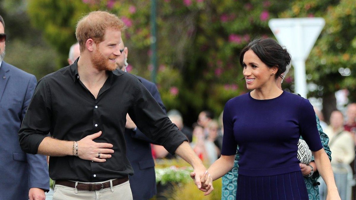 Enrique y Meghan, cómplices, durante su viaje a Nueva Zelanda, a finales de octubre.-