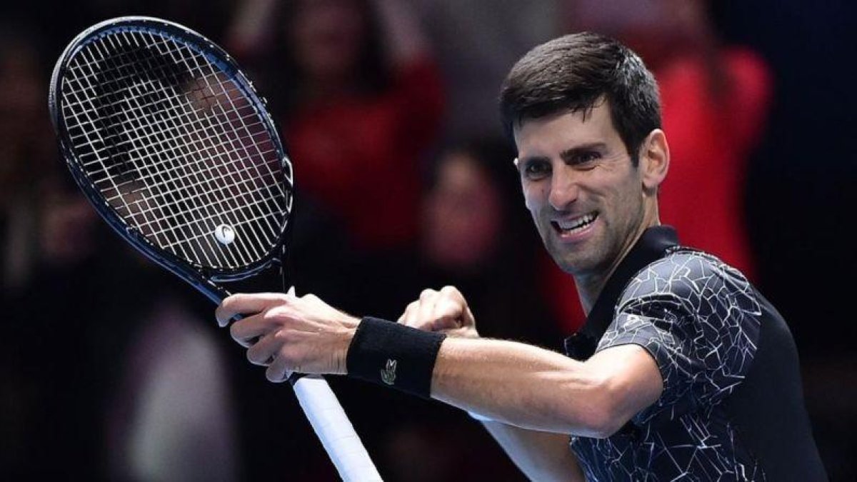 Novak Djokovic celebra uno de sus puntos ganadores en Londres.-AFP / GLYN KIRK