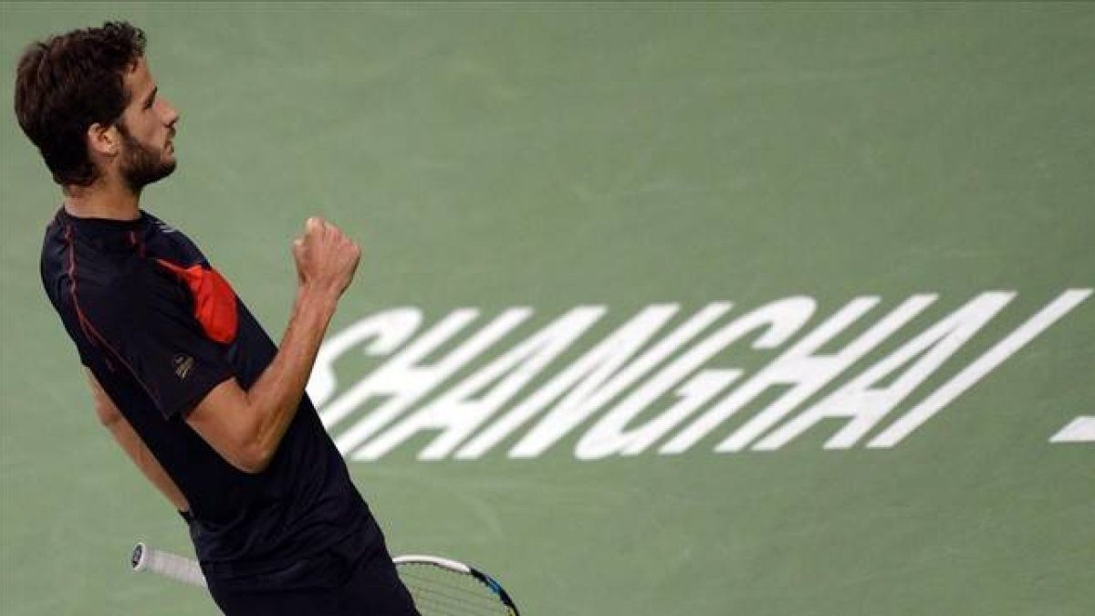 Feli López celebra su triunfo en Shanghái.-Foto: AFP / JOHANNES EISELE