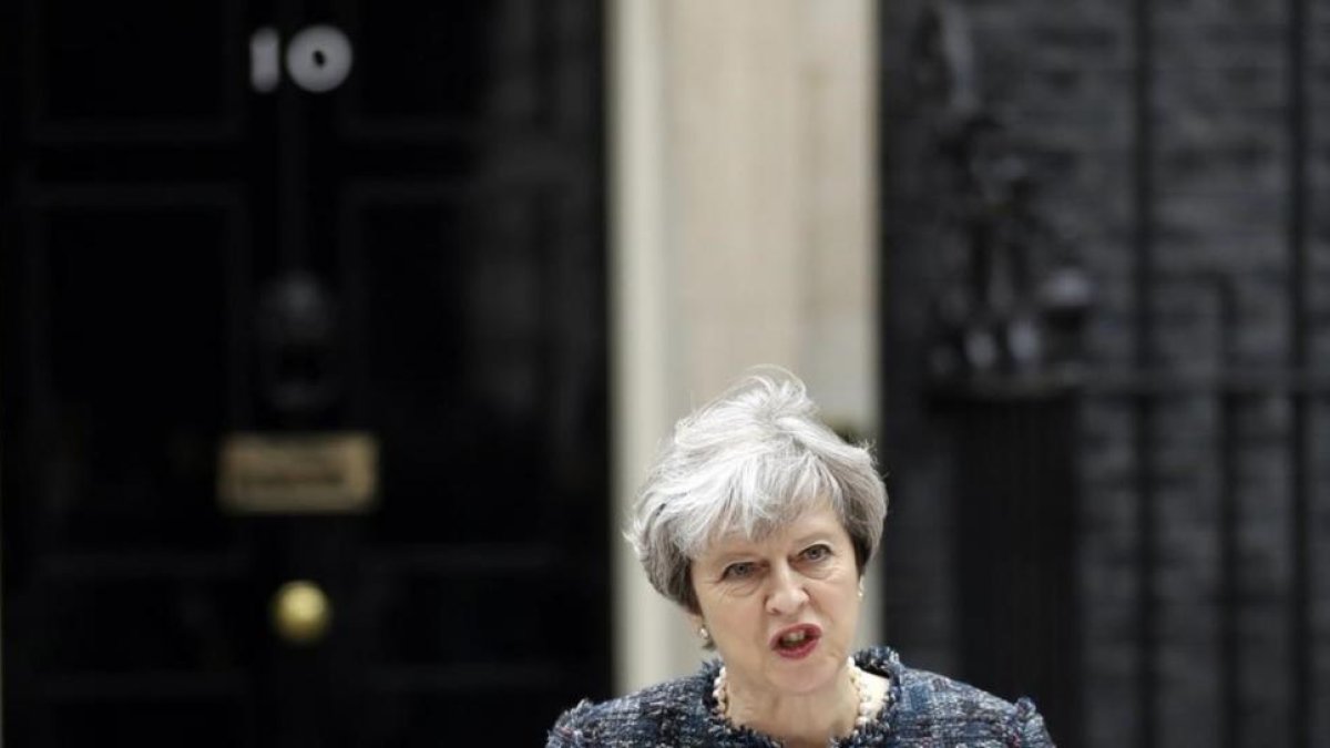 Theresa May durante su comparecencia en Downing Street.-MATT DUNHAM