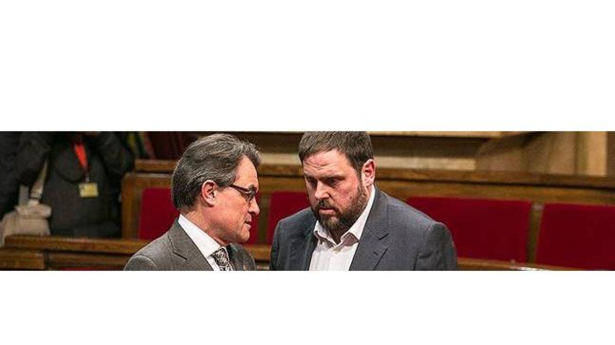 Artur Mas y Oriol Junqueras, en el Parlament.-