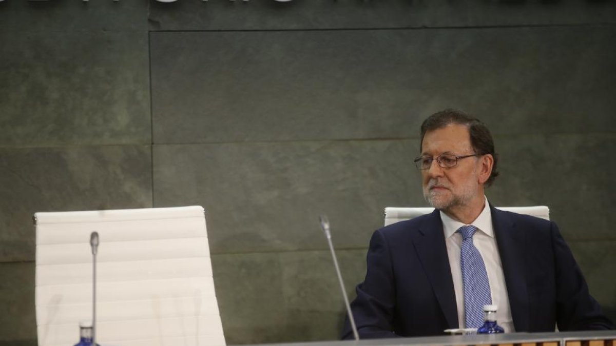 Comunidad de Madrid. Mariao Rajoy presenta el libro e Luis de Guindos-JAVIER BARBANCHO
