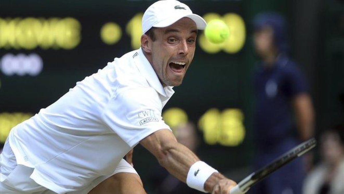 Bautista, en un momento del partido ante Djokovic.-AP / CARL RECINE