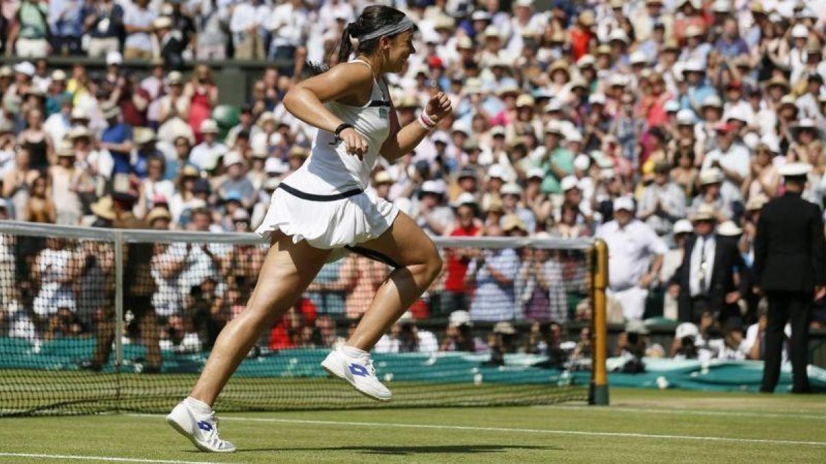 Marion Bartoli, en el torneo de Wimbledon que conquistó en julio del 2013.-STEFAN WERMUTH
