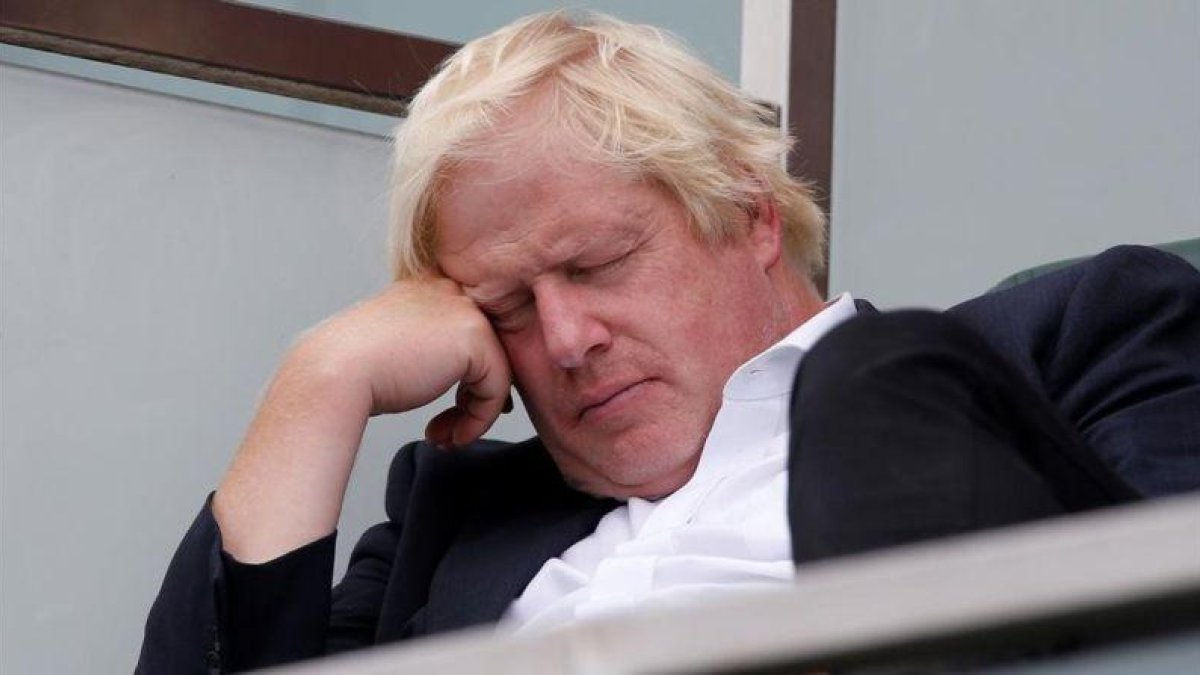 Boris Johnson, el sábado durante un partido de críquet entre India e Inglaterra.-AFP / IAN KINGTON