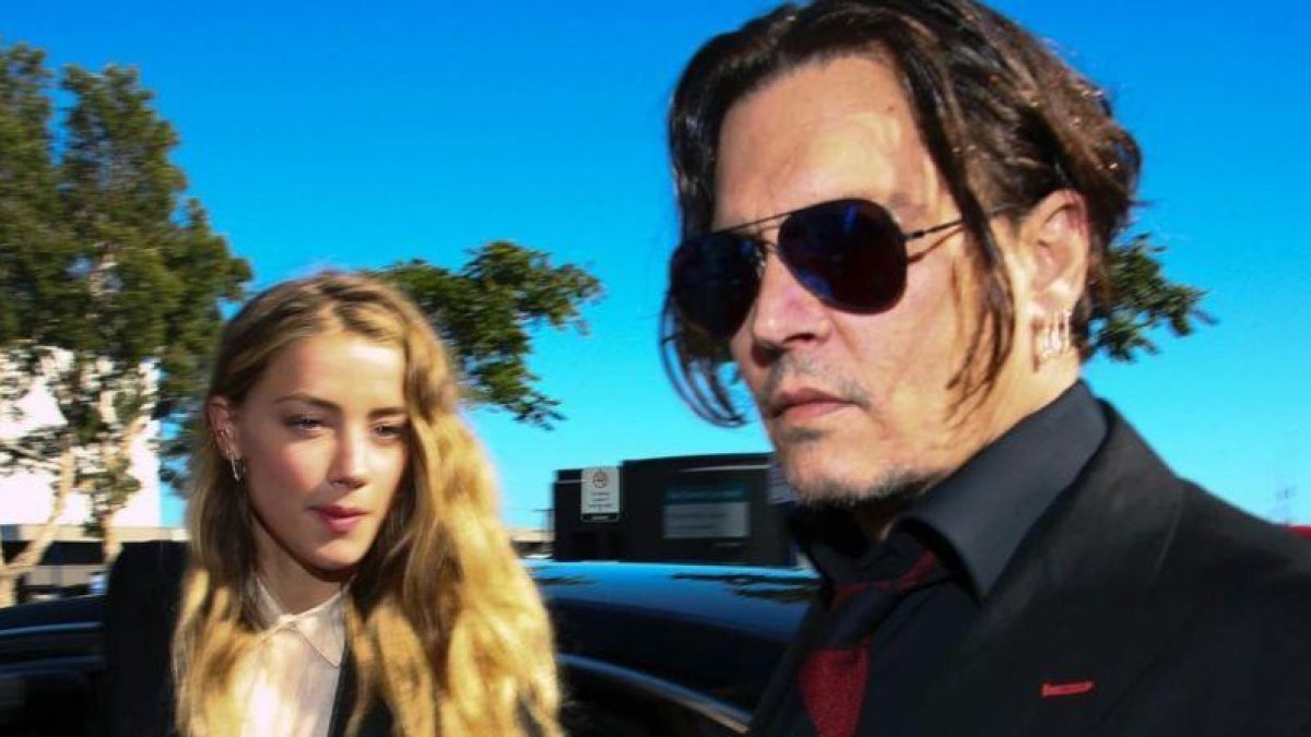 Amber Heard y Johnny Depp.-AFP / PATRICK HAMILTON