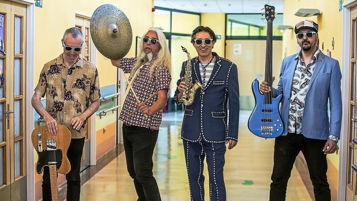 Fernando Su, Antolín Olea, José Luis Gutiérrez y César Díez, el Capitán Corchea con su banda.-CHUCHI GUERRA