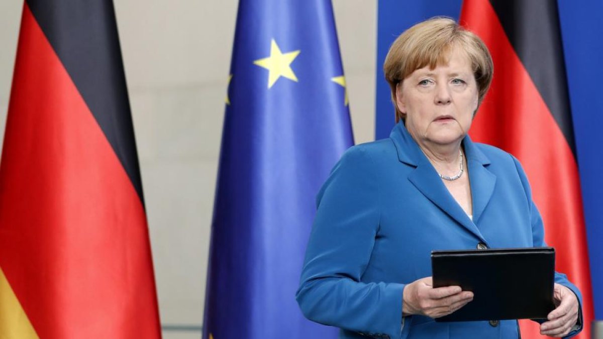 Merkel en la comparecencia de este sábado por la matanza de Múnich.-MICHAEL SOHN / AP