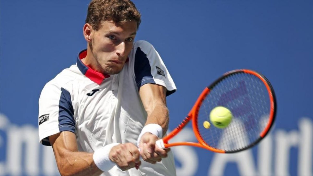 Carreño devuelve un revés, durante su partio contra Schwartzman-JASON DECROW (AP)
