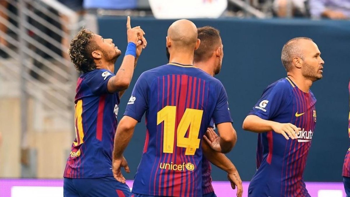 Neymar celebra su primer gol ante la Juve.-AFP / JEWEL SAMAD
