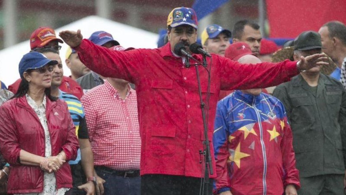 Nicolás Maduro en un acto político el pasado 24 de marzo en Caracas.-AP / ARIANA CUBILLOS