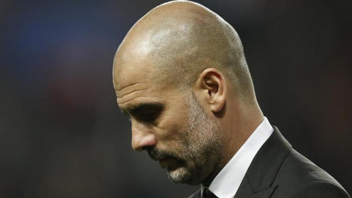 Guardiola, cabizbajo tras la eliminación de su equipo de la Liga de Campeones.-EFE
