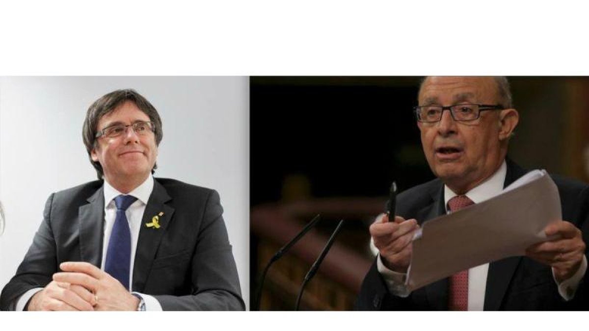A la izquierda, Carles Puigdemont, expresident de la Generalitat. A la derecha, Cristóbal Montoro, ministro de Hacienda-EL PERIÓDICO
