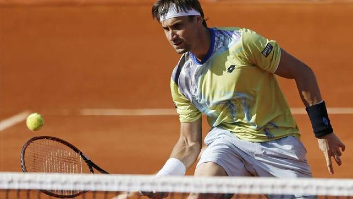 David Ferrer volea en al partido ante Andy Murray.-Foto: REUTERS / PASCAL ROSSIGNOL