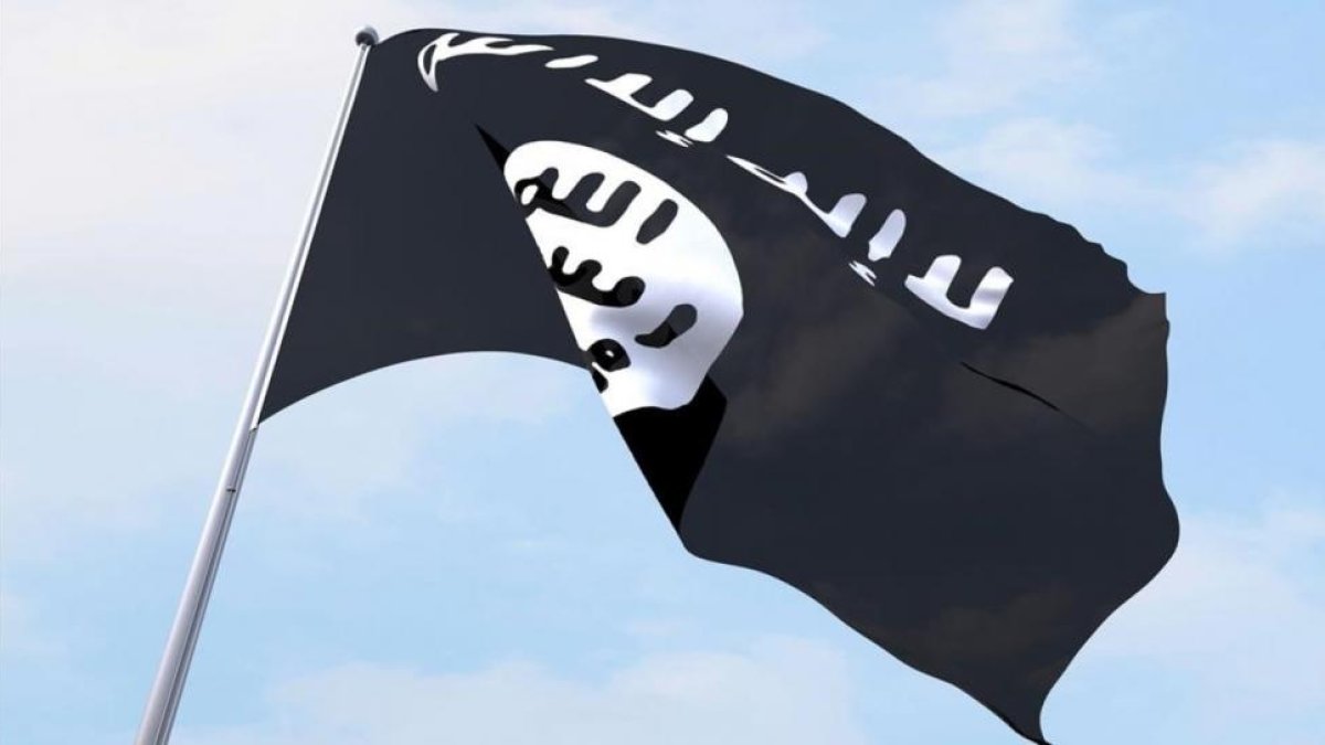 Una bandera del Estado Islámico ondeando.-