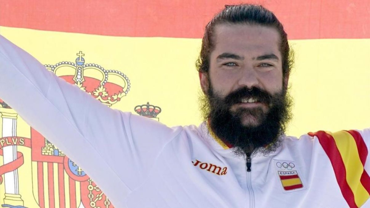 Regino Hernández celebra su bronce en Pyeongchang.-EFE / SERGEI ILNITSKY
