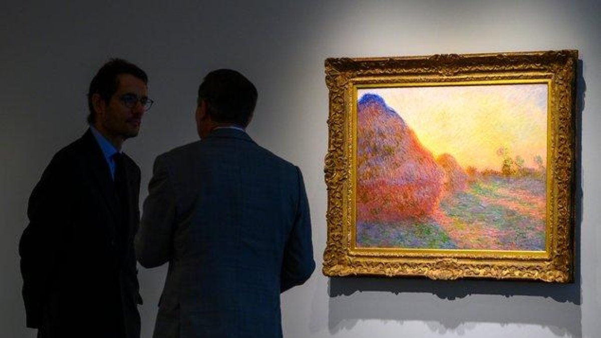 Esta pintura es una de las pocas de la serie Almiares de Monet que han salido a subasta este siglo.-AFP
